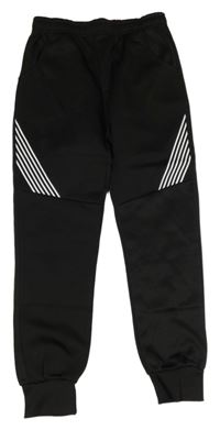 Černo-bílé sportovní tepláky s pruhy 