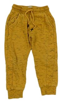 Hořčicovo-černé melírované tepláky F&F