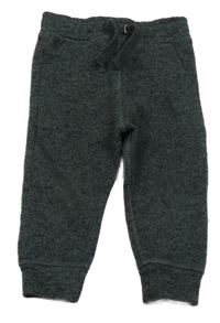 Tmavošedo-černé melírované pletené tepláky Tu