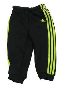Černo-neonově zelené tepláky s logem Adidas