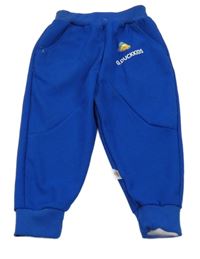 Tmavomodré tepláky s nápisem