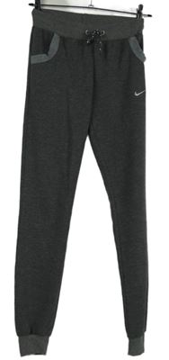 Dámské tmavošedé vzorované tepláky s logem Nike