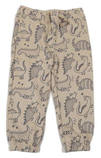 Béžové tepláky s dinosaury Primark