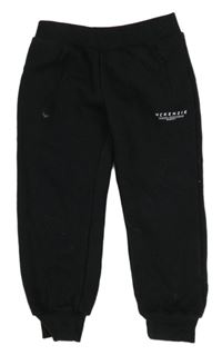 Černé teplé tepláky s logem MCKENZIE.