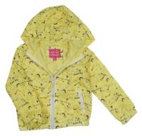 Žlutá šusťáková jarní bunda s jednorožci a kapucí