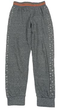 Šedo-oranžové melírované tepláky s hvězdami 