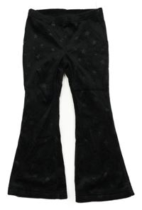 Černé plyšové flare kalhoty s hvězdičkami C&A