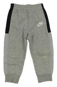 Šedo-černé melírované tepláky s logem Nike