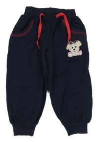 Tmavomodré tepláky s psem s flitry