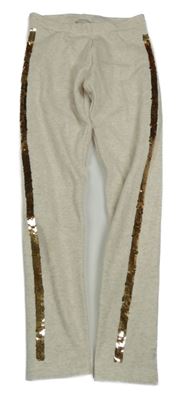 Světlebéžové melírované teplákové teplé legíny s pruhem z překlápěcích flitrů C&A