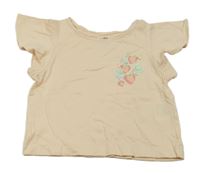 Pudrové tričko s jahůdkami a volánky H&M