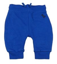 Safírové tepláky s výšivkou St. Bernard