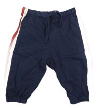 Tmavomodré tepláky s bílým a červeným pruhem H&M
