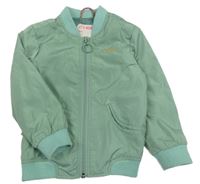 Zelená šusťáková jarní bunda s výšivkou na zádech 