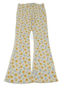 Smetanové žebrované flare kalhoty s kytičkami C&A