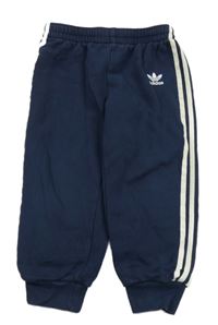 Tmavomodré tepláky s logem Adidas