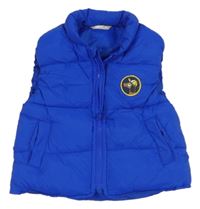 Modrá šusťáková zateplená vesta s nášivkou