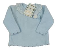 Nové - Světlemodrý svetr s volánkem a bambulkami 