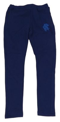 Tmavomodré skinny tepláky s logem 