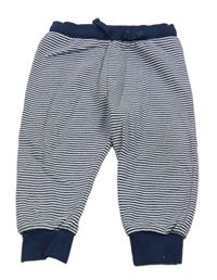 Tmavomodro-bílé pruhované tepláky M&S