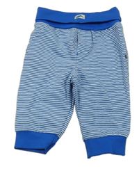 Tmavomodro-bílé pruhované tepláky 