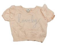 Broskvová vzorovaná pletená vesta s nápisem a volánky RIVER ISLAND