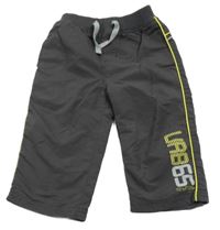 Tmavošedé šusťákové kalhoty s číslem a pruhem URBAN RASCALS