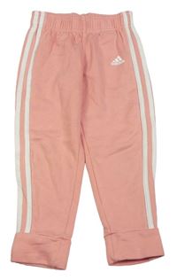 Růžové tepláky s pruhy a logem Adidas 