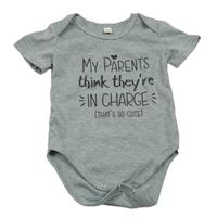 Šedé melírované body s nápisem