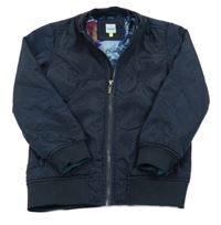 Tmavomodrý vzorovaný šusťákový lehce zateplený bomber baker