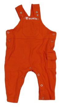 Červené laclové tepláky s nápisem 