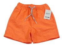 Nové - neonově oranžové vzorované plážové kraťasy Next