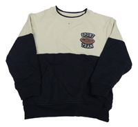 Tmavomodro-smetanová mikina s nápisem a míčem Orchestra 