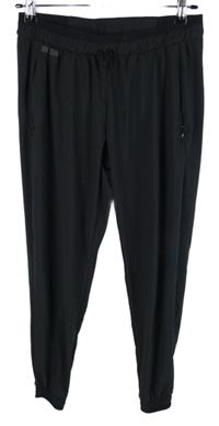 Dámské černé šusťákové cuff kalhoty Kalenji 