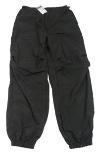 Nové - černé šusťákové cuff kalhoty Primark