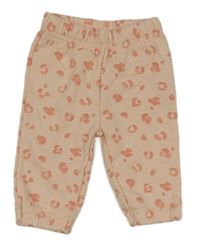 Světlebroskvovo-růžové vzorované tepláky PRIMARK