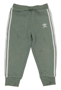 Zelené tepláky s pruhy a logem Adidas