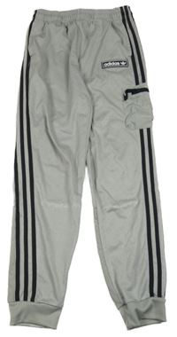 Světlešedé sportovní kalhoty s logem Adidas
