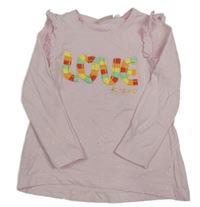 Světlerůžové puntíkaté triko s nápisem a volánky 