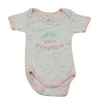 Šedé melírované body s růžovým lemem a nápisem 