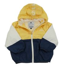 Žluto-bílo-tmavomodrá šusťáková jarní bunda s kpaucí C&A