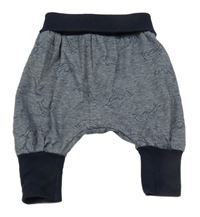 Tmavomodro-bílé žíhané baggy tepláky s delfíny 