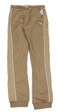 Nové - Béžové tepláky se vzorem Nutmeg