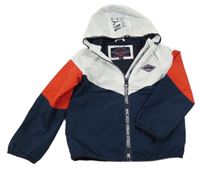 Bílo-tmavomodro-červená šusťáková jarní bunda s nášivkou a kapucí C&A