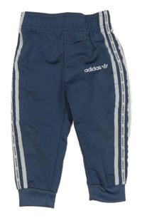 Modrošedé sportovní tepláky s logem Adidas