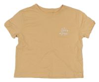 Světleoranžové crop tričko s nápisem 