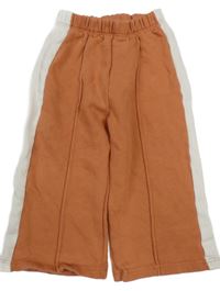 Oranžovo-bílé wide leg tepláky s puky Disney