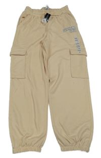 Nové - světlebéžové cargo tepláky s nápisy St. Bernard