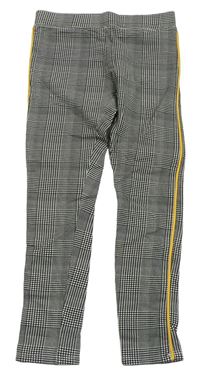 Černo-bílé kostkované legíny s pruhem H&M