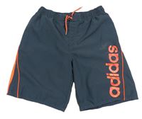 Tmavomodré plážové kraťasy s nápisem Adidas